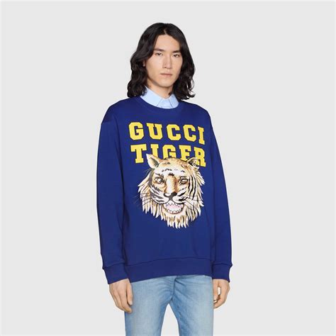 felpa gucci blu arancione|Gucci Tiger felpa in cotone in blu .